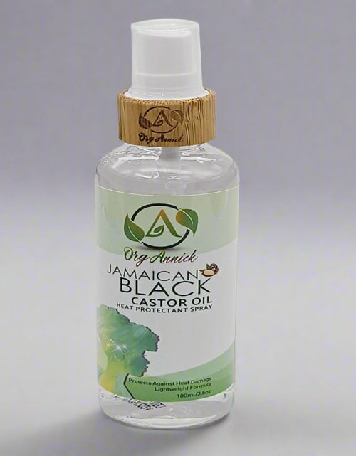 Load image into Gallery viewer, Protect &amp; Detangle: Jamaican Black Castor Oil Heat Protectant Spray &amp; Hair Detangler 3.5 oz
