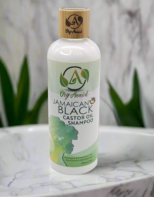 Load image into Gallery viewer, Nourish &amp; Flourish Jamaican Black Castor Oil Shampoo: Nature&#39;s Secret to Healthy Hair - 10oz
