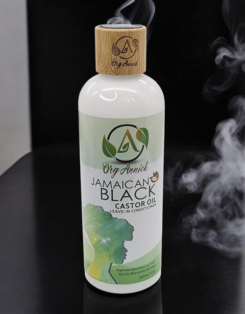 Load image into Gallery viewer, Jamaican Black Castor Oil Leave-In Detangler for Silky, Manageable Hair - 10oz
