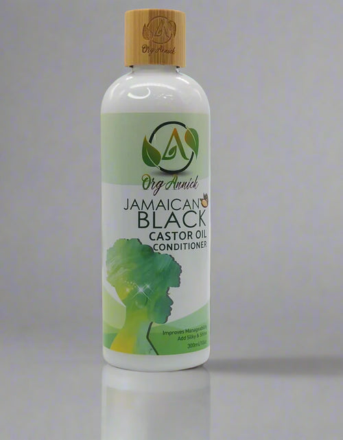 Load image into Gallery viewer, Nourish &amp; Flourish Jamaican Black Castor Oil Conditioner: Nature&#39;s Secret to Healthy Hair - 10oz
